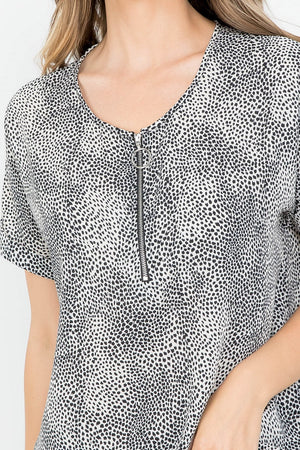 Short sleeve animal print zipper front dolman blouse top