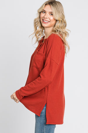 Long sleeve pocket hi low knit rust top