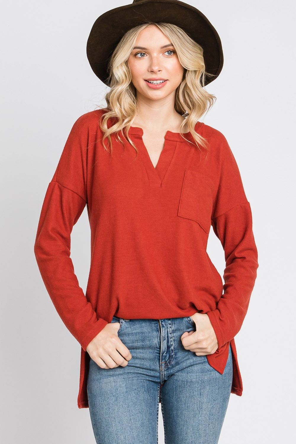 Long sleeve pocket hi low knit rust top